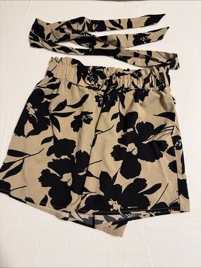 SHEIN Black Floral High-Waist Paperbag Shorts on Tan-s4